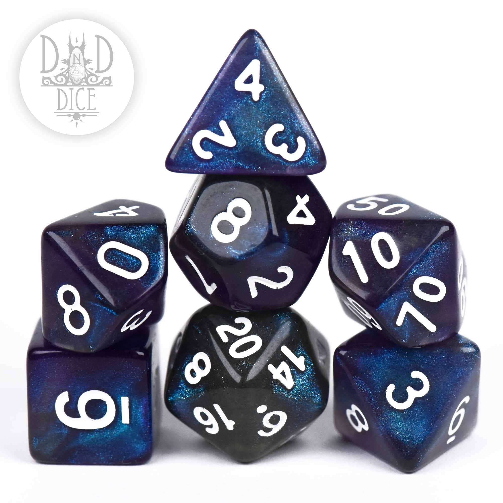 Abyss acrylic DND dice set, blue-black with white numbers, displayed on a white background.