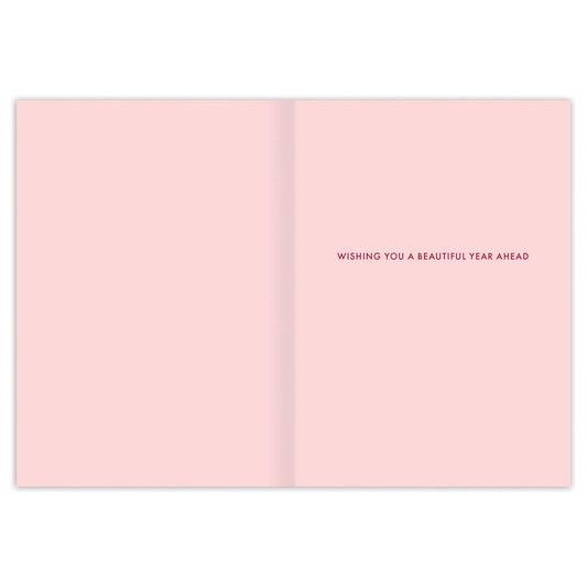 Rainbow Mountain Birthday Card, open pink card with WISHING YOU A BEAUTIFUL YEAR AHEAD by Rhi James.