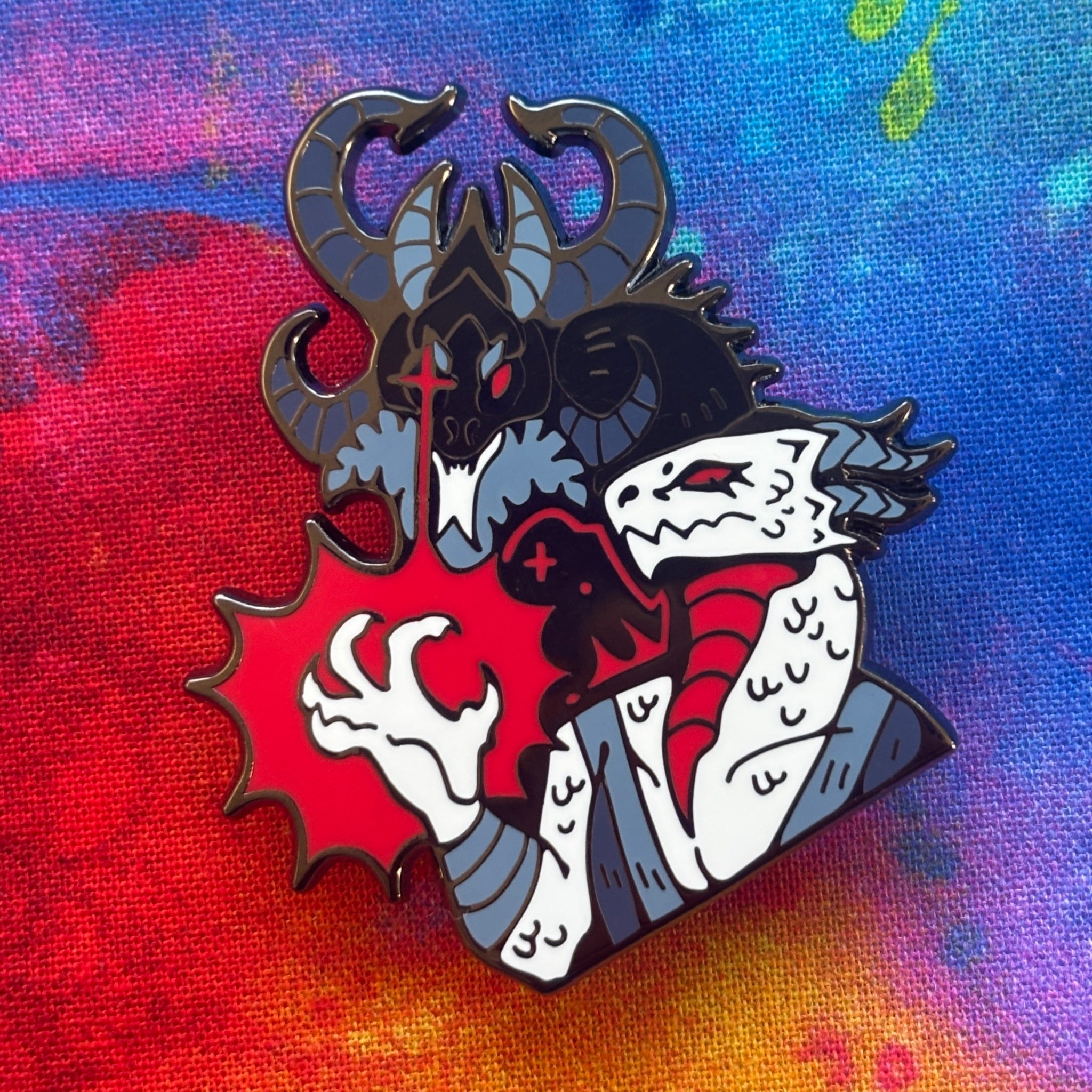 Dark Urge Pin featuring a horned dragon and a white, red-eyed dragon with fiery magic.