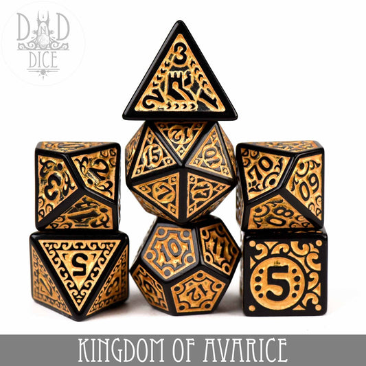 Kingdom of Avarice 7-piece black and gold ornate acrylic dice set for tabletop gaming.