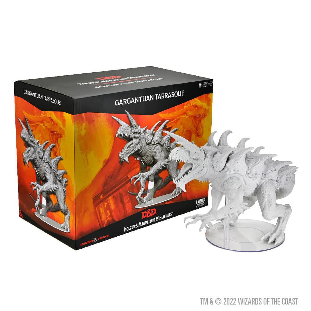 Unpainted Gargantuan Tarrasque Miniature next to Nolzur’s Marvelous Miniatures D&D box.