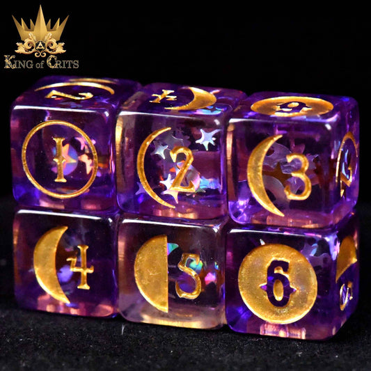 Moonlit Night 12-piece dice set, translucent purple with gold numbers and moon designs.