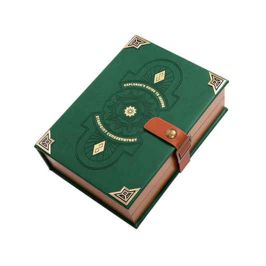 Critical Role Dice Tome Rolling Tray styled as a green box with gold designs resembling a book.