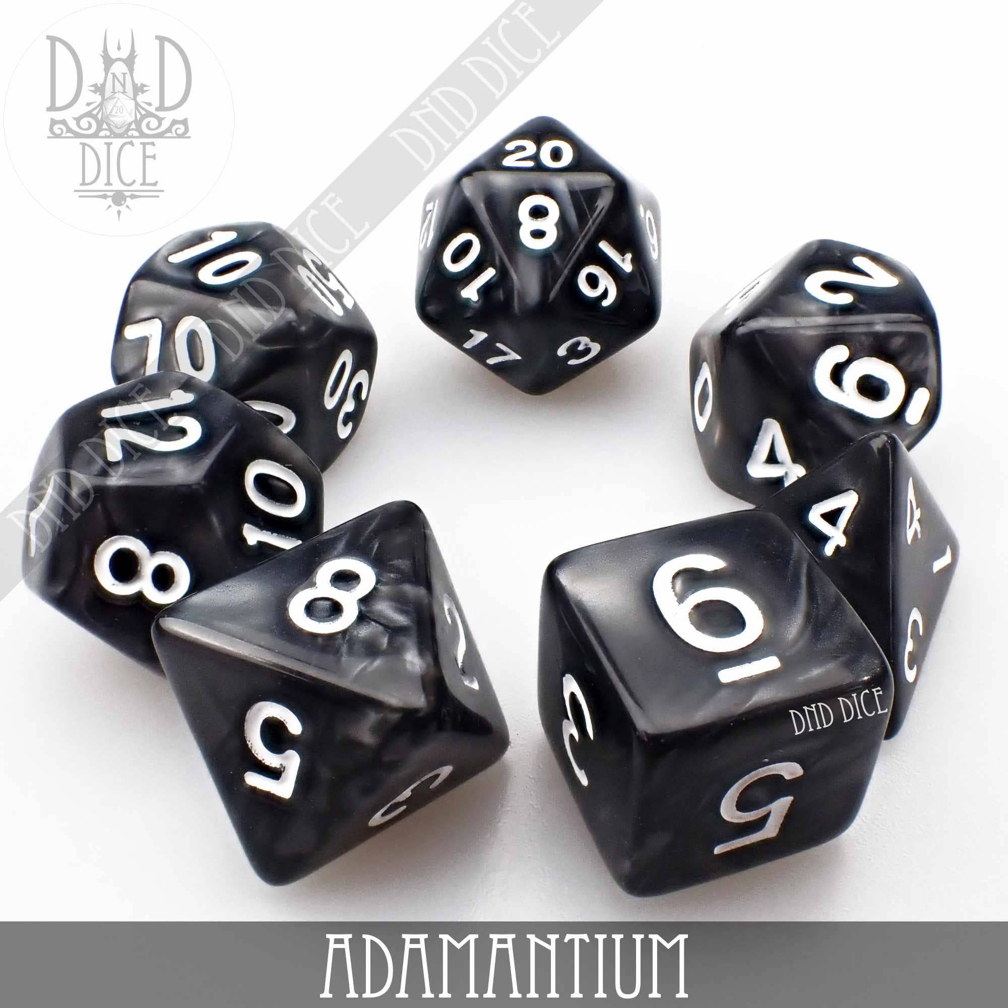Adamantium dice set, 7 or 11 pieces, black and white color, on a white background.
