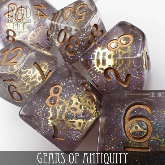 Gears of Antiquity resin DND dice set with glitter, gold numbers, and gear designs inside each polyhedral die.