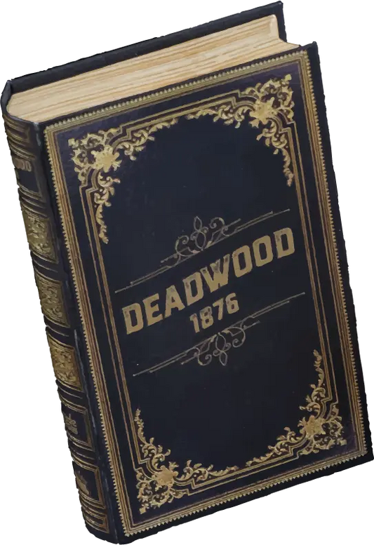 Deadwood 1876 board game in a black box with gold accents and title on the cover.