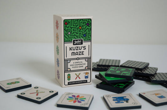 Kuzus Maze board game with game tiles displaying assorted symbols and patterns.