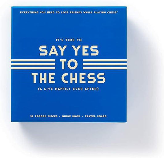 Blue box labeled Its Time to Say Yes to Chess Travel Edition with beginner set information in white text.