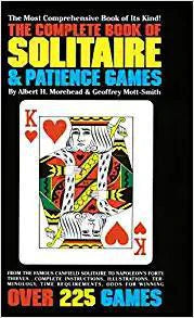 The Complete Book of Solitaire and Patience Games book cover with card game instructions.
