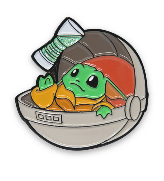 Jabba Juice Pin featuring a cartoon green alien baby in orange sipping Jabba Juice in a gray hover pod.
