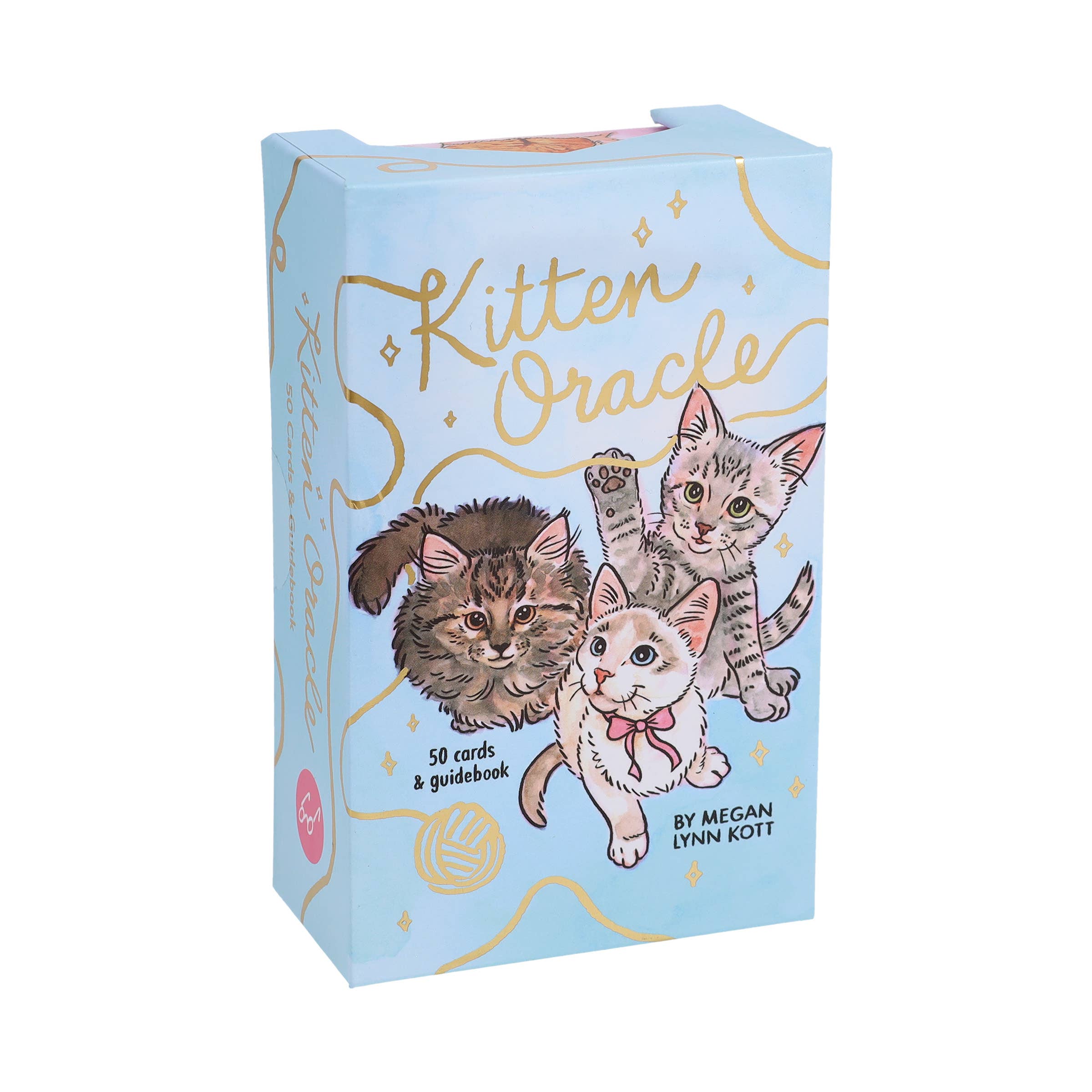 Kitten Oracle deck in pastel box with gold accents and three illustrated kittens on oracle cards.