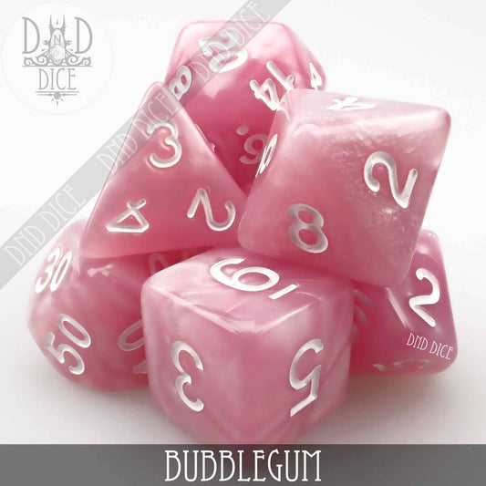 Bubblegum shiny pink acrylic 7-dice set with white numbers.