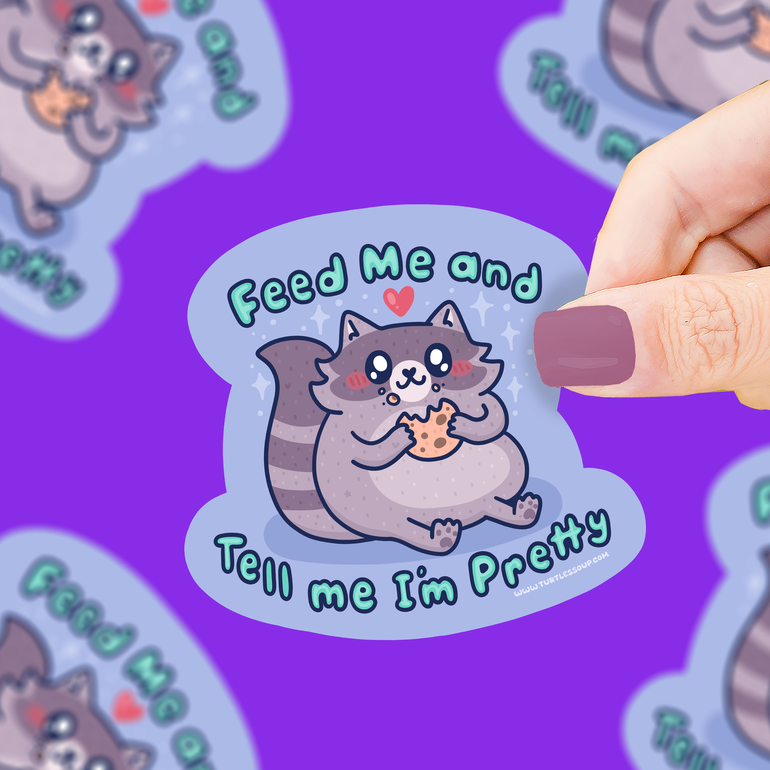 Waterproof vinyl sticker of a cartoon raccoon holding a cookie with text Feed Me | Tell Me Im Pretty.