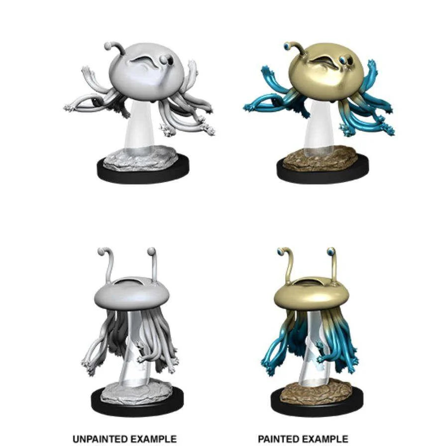 Four D&D Nolzurs Marvelous Unpainted Miniatures W12 Flumph: two gray, two painted gold and blue, shown side by side.