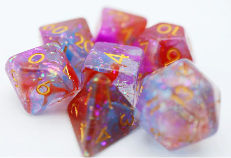 The Dawning RPG Dice Set includes colorful, sparkly resin polyhedral dice with gold numbers for D&D games.