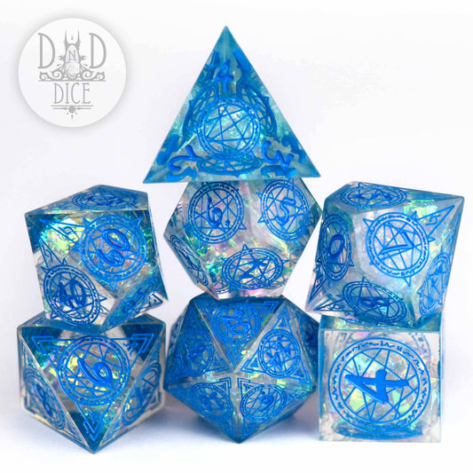 Crown of Magic handmade blue translucent 7-piece dice set with mystical symbols for DND.