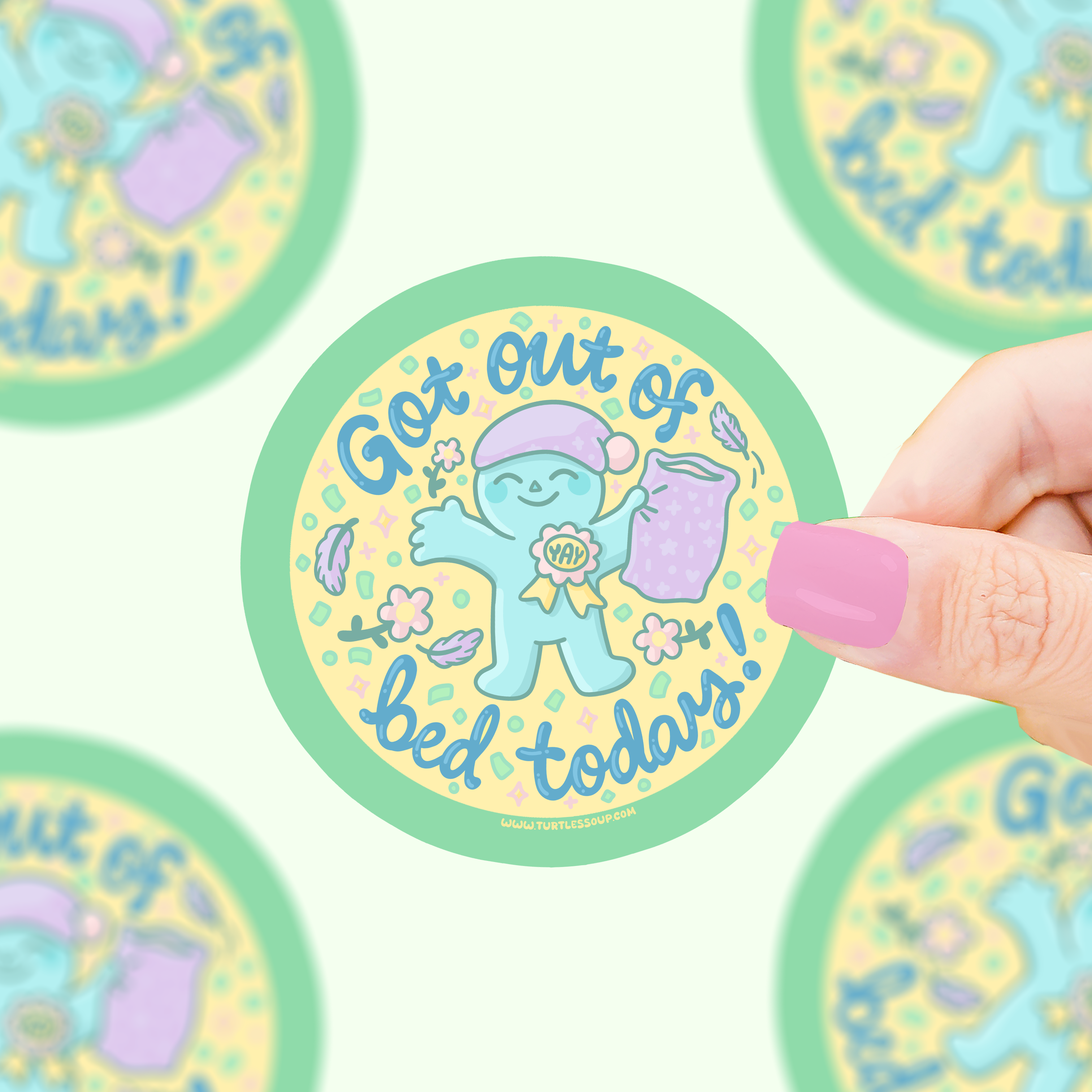 Got Out Of Bed Today vinyl sticker held by a hand with pink nails.