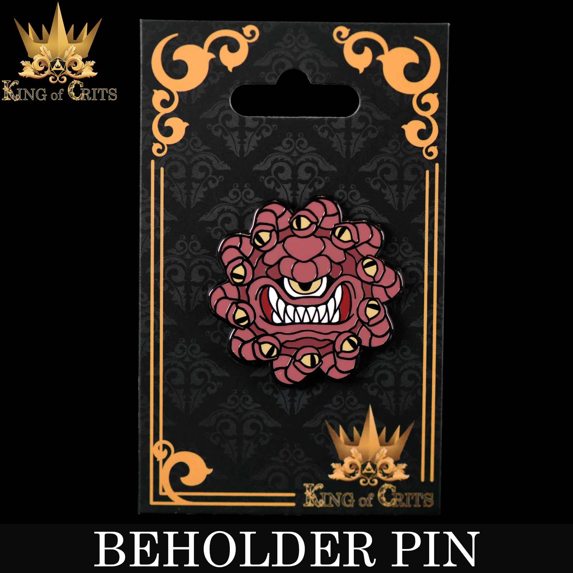Red Beholder enamel pin with a many-eyed monster and a toothy grin.