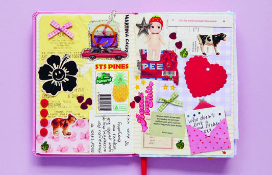 The Art of Memory Collecting scrapbook kit includes stickers, drawings, and notes.