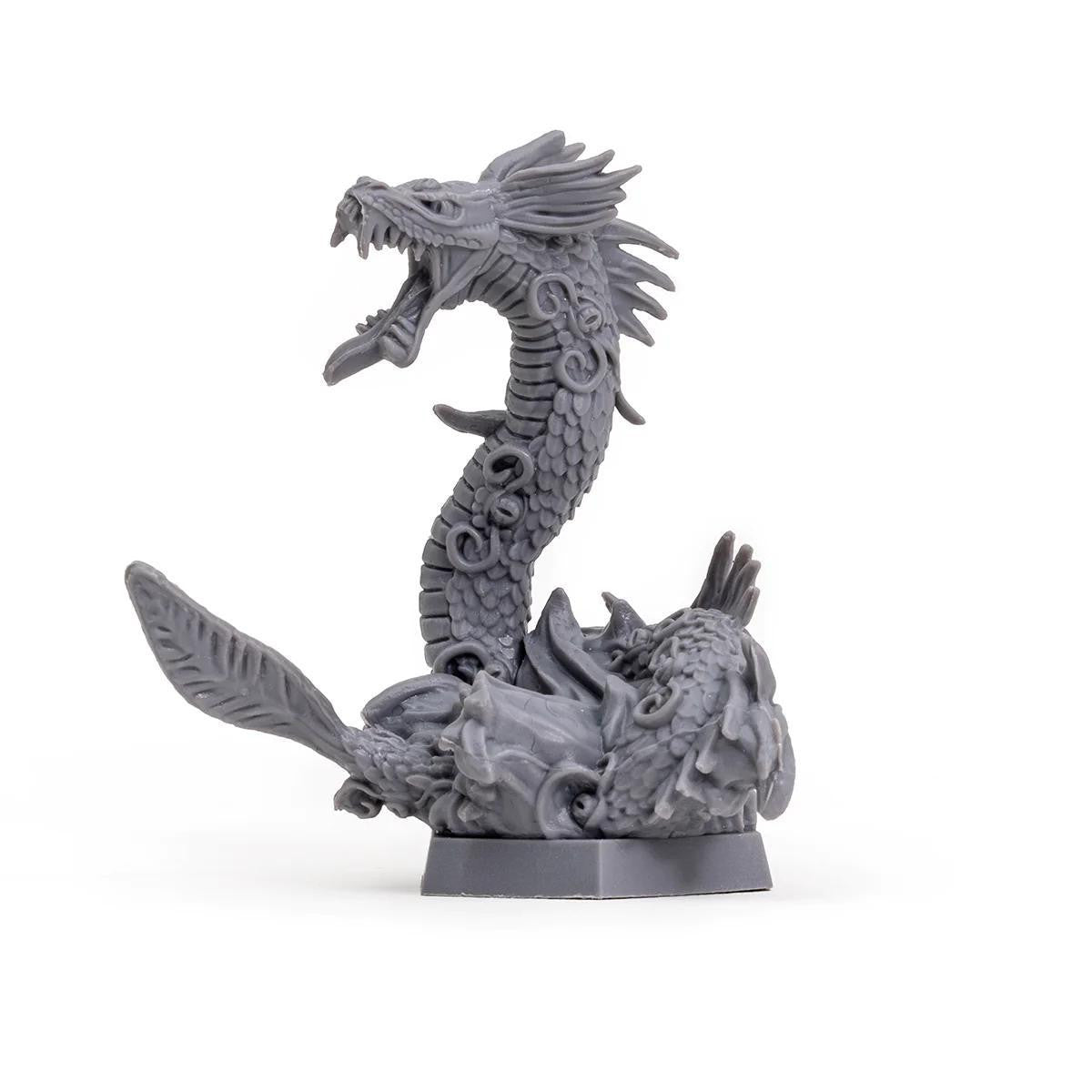 Gray coiled dragon miniature with open mouth and detailed scales, designed for Ukotoa by Critical Role.