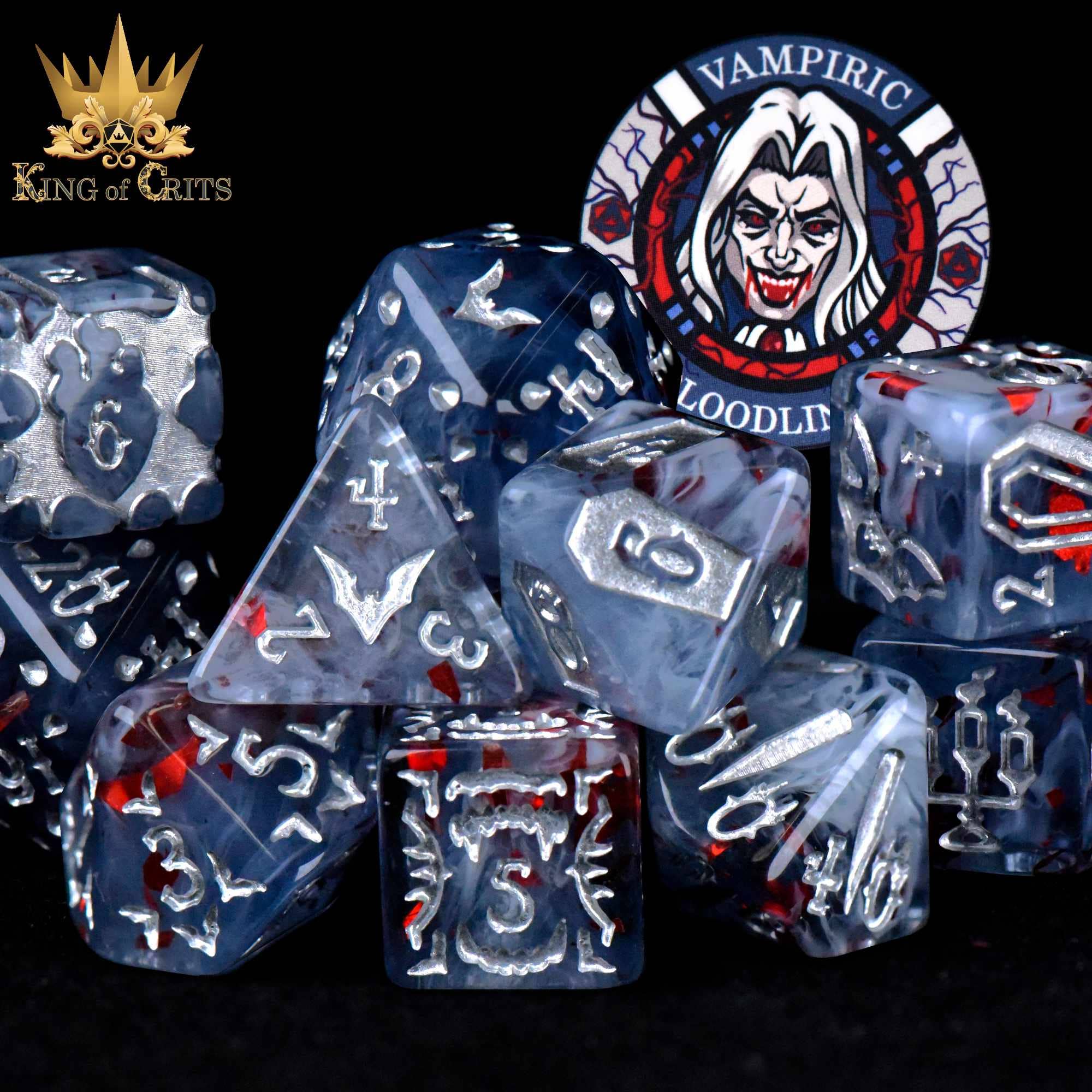Vampiric Bloodline 11 dice set with blue, white, and red DnD dice, silver numbers, vampire token, and logo.