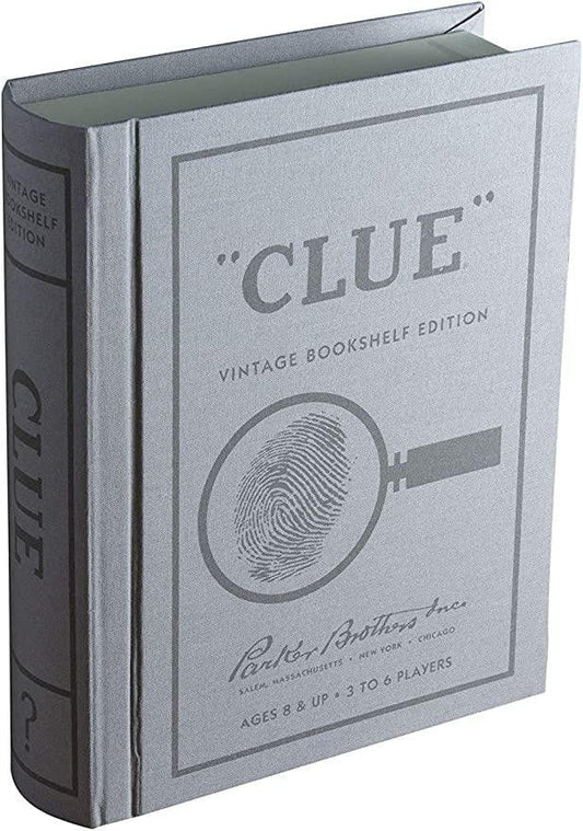 Clue Vintage Bookshelf Edition board game in a book-shaped box with a magnifying glass design.