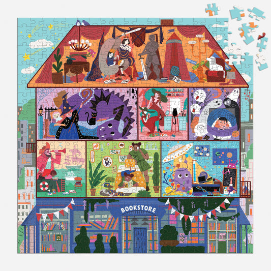 The Magic of Stories 500 Piece Family Puzzle showing a three-story house, animals, and a bookstore on the ground floor.