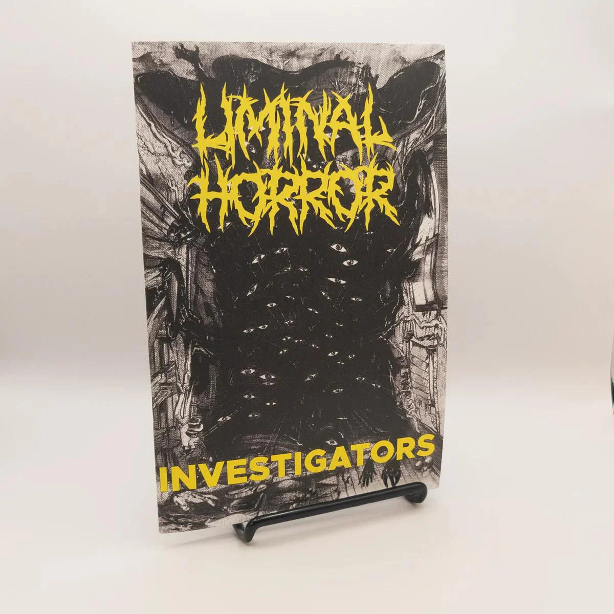 Liminal Horror: Investigations Role Playing Game, rules-lite RPG with bold yellow text on a dark abstract cover.
