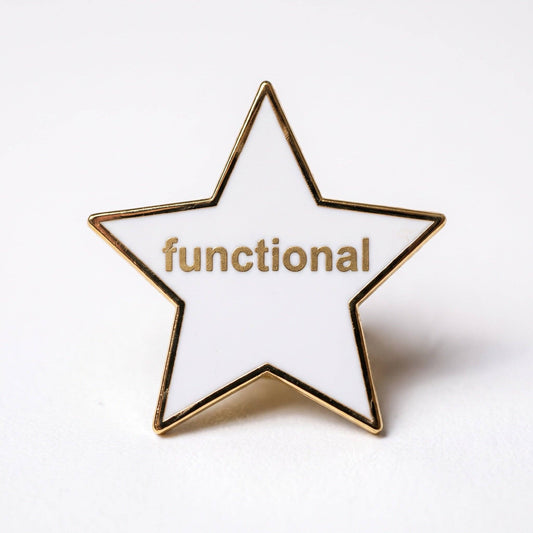 White star-shaped hard enamel pin with gold trim and the word functional in gold lettering.