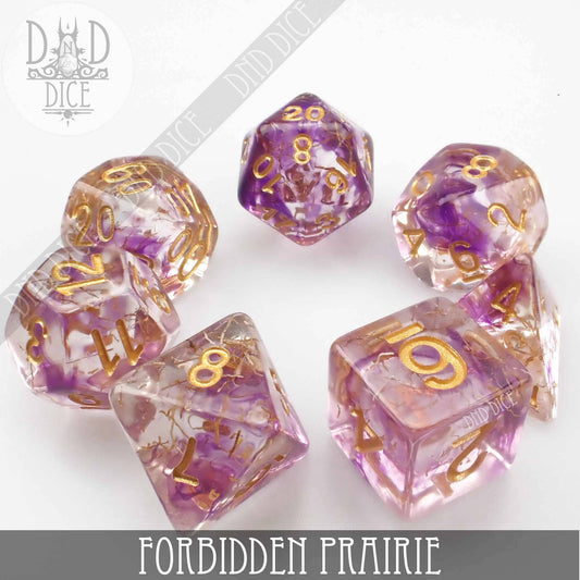 Forbidden Prairie 7-dice set, clear resin with purple and gold sparkles, gold numbers.