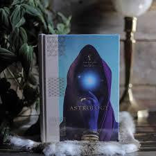 Astrology, The Library of Esoterica book with a cover showing a veiled figure holding a glowing orb.