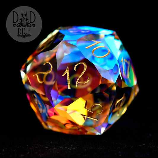 Gem Cut Prism 30mm D20, faceted iridescent die with gold on black, shown in a gift box.