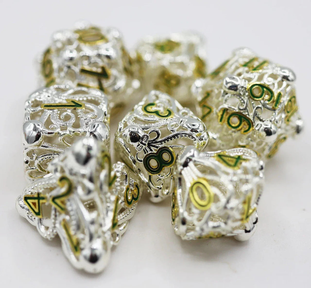 Celestial Mind Eater Hollow RPG Dice Set, silver with yellow-green numbers, displayed on a white surface.