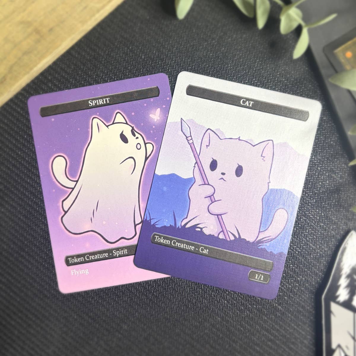 Spirit & Cat Token Set with two illustrated trading cards: flying Snow Cat spirit and one wielding a spear.