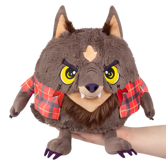 Mini Squishable Werewolf plush wearing a red and black plaid shirt.