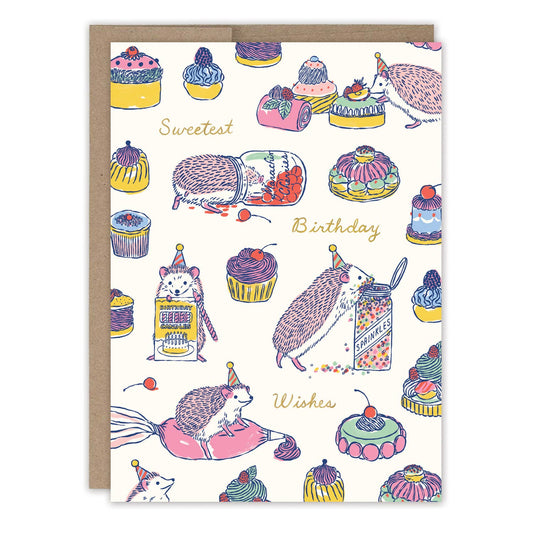 Sweet Treats Hedgehog Birthday Card with hedgehogs in party hats, cupcakes, and “Sweetest Birthday Wishes” text.