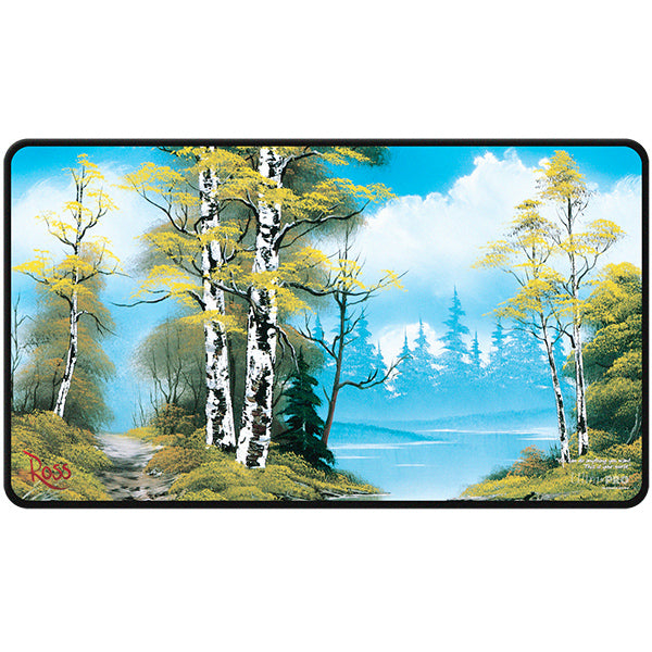 Playmat featuring birch trees, yellow-green foliage, lake, mountains; Black Stitched–Bob Ross Lakeside Path.