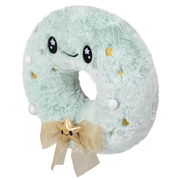 Mint-green plush Squishable Flocked Wreath with smiling face, gold stars, white dots, and a gold bow.