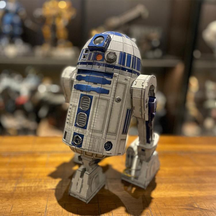4D Star Wars Model R2-D2 on a wooden surface.