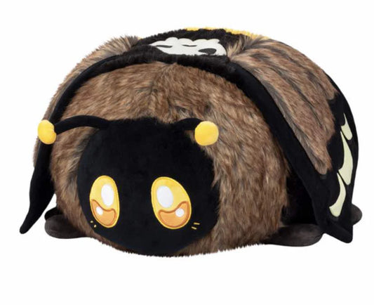 Squishable Deaths Head Hawkmoth plush toy made of polyester, round with brown fur and large yellow eyes.