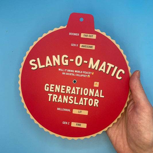 Slang-o-Matic Generational Translator, a red wheel chart for translating slang between age groups, held in a hand.