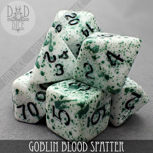 Goblin Blood Spatter (Hand Painted) set: 7 white acrylic dice with green splatter and black numbers.