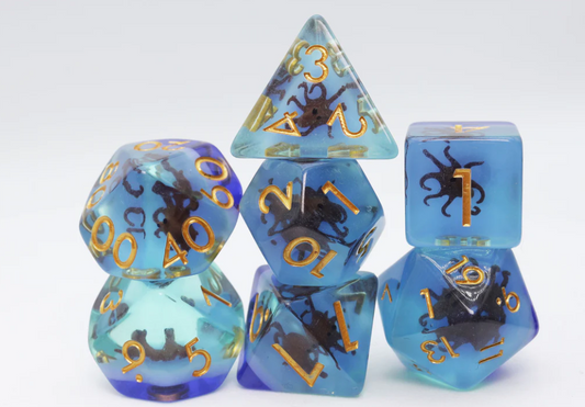 Coffee Octopus RPG Dice Set with blue and teal polyhedral dice, gold numbers, and small octopus figures.