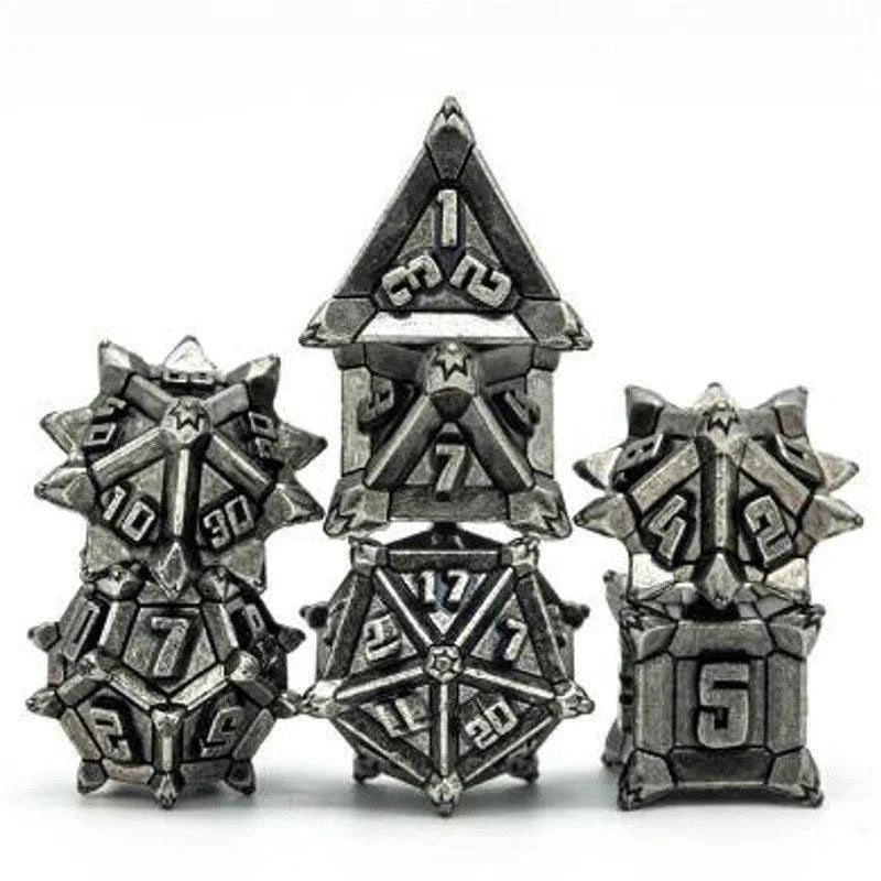 Ancient Silver Flail RPG Metal Dice Set with five ornate, spiked metal dice.