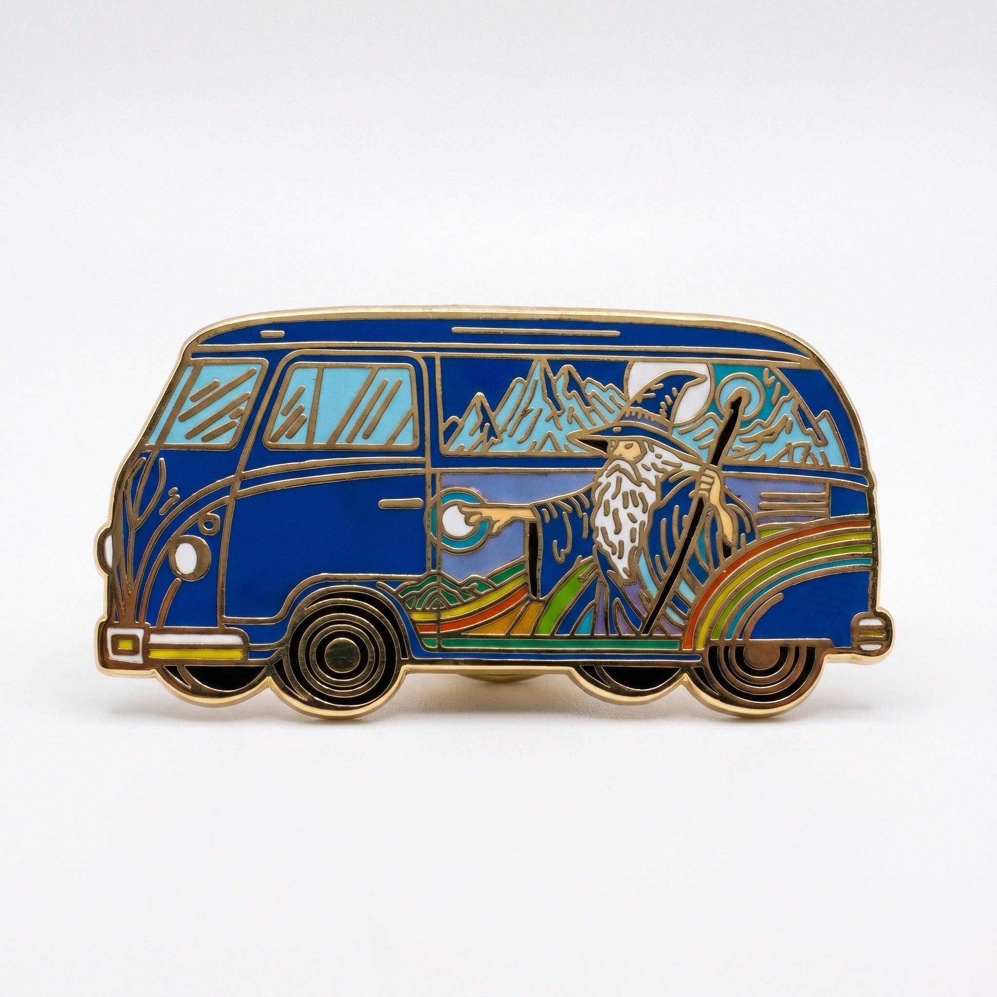 Stoner Van pin: gold-plated blue van featuring a wizard with a staff and mountain scenery.