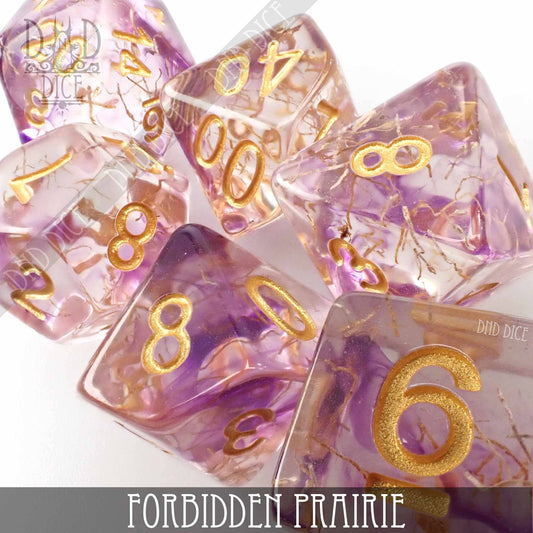 Forbidden Prairie resin 7-dice set with gold numbers and plant-themed inclusions for tabletop games.