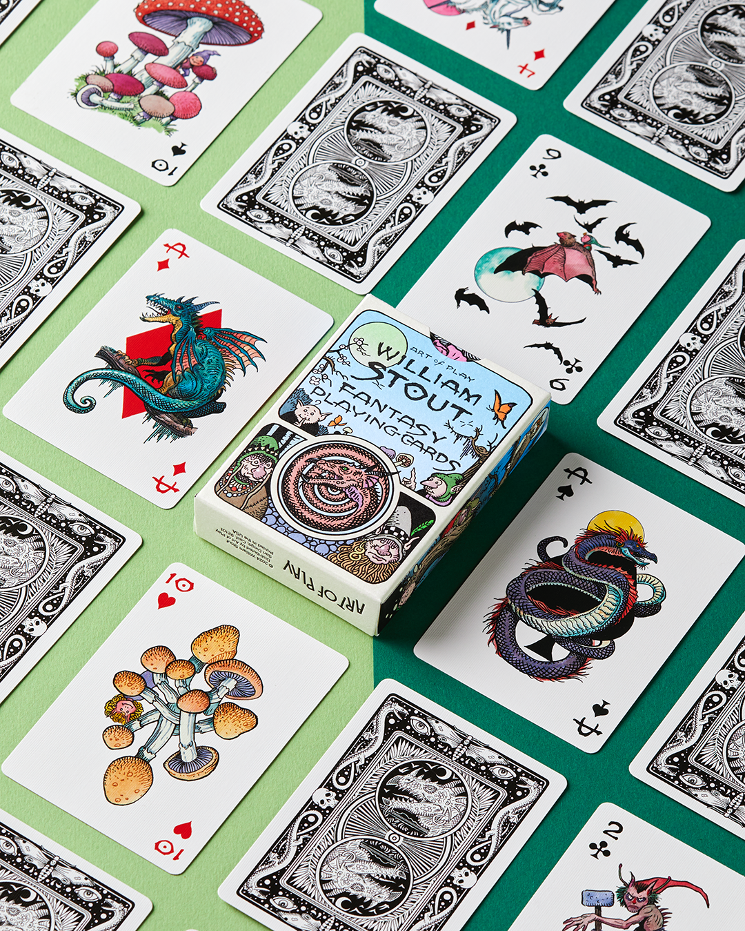 William Stout transformation deck with fantasy playing cards featuring creatures and mushrooms.