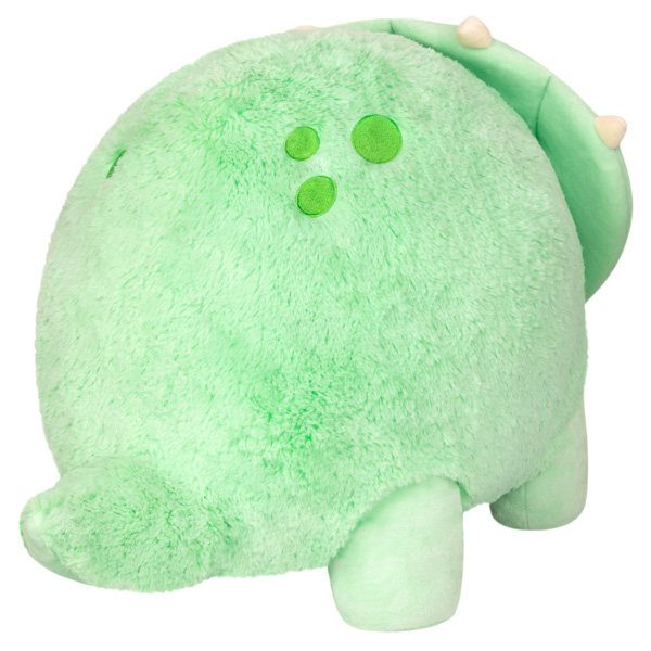 Round green Triceratops Squishable plush with three spots and short legs, facing slightly left.