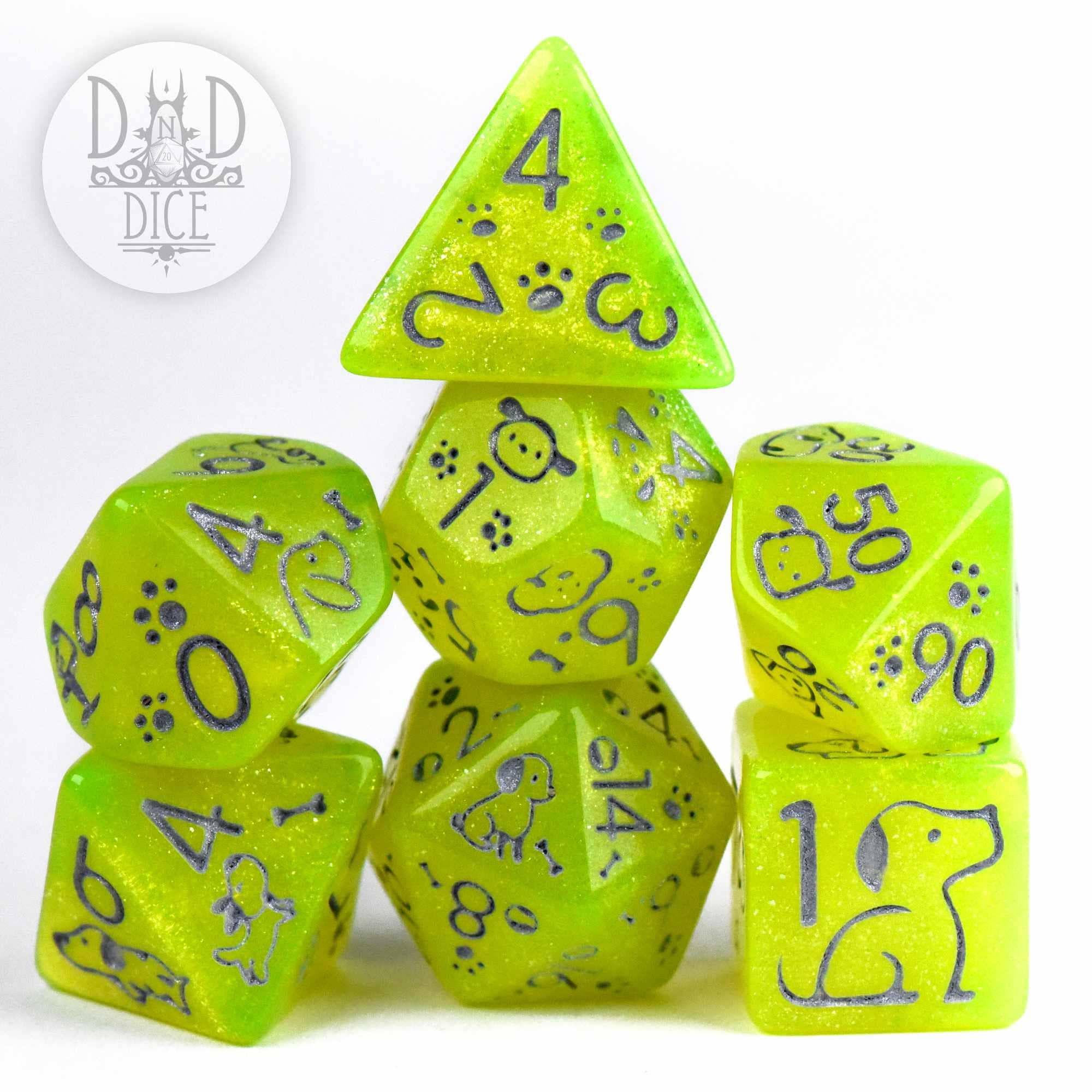 Puppers Tennis Ball 7-dice set, sparkly yellow-green with dog designs. Suitable for DnD and collectors.