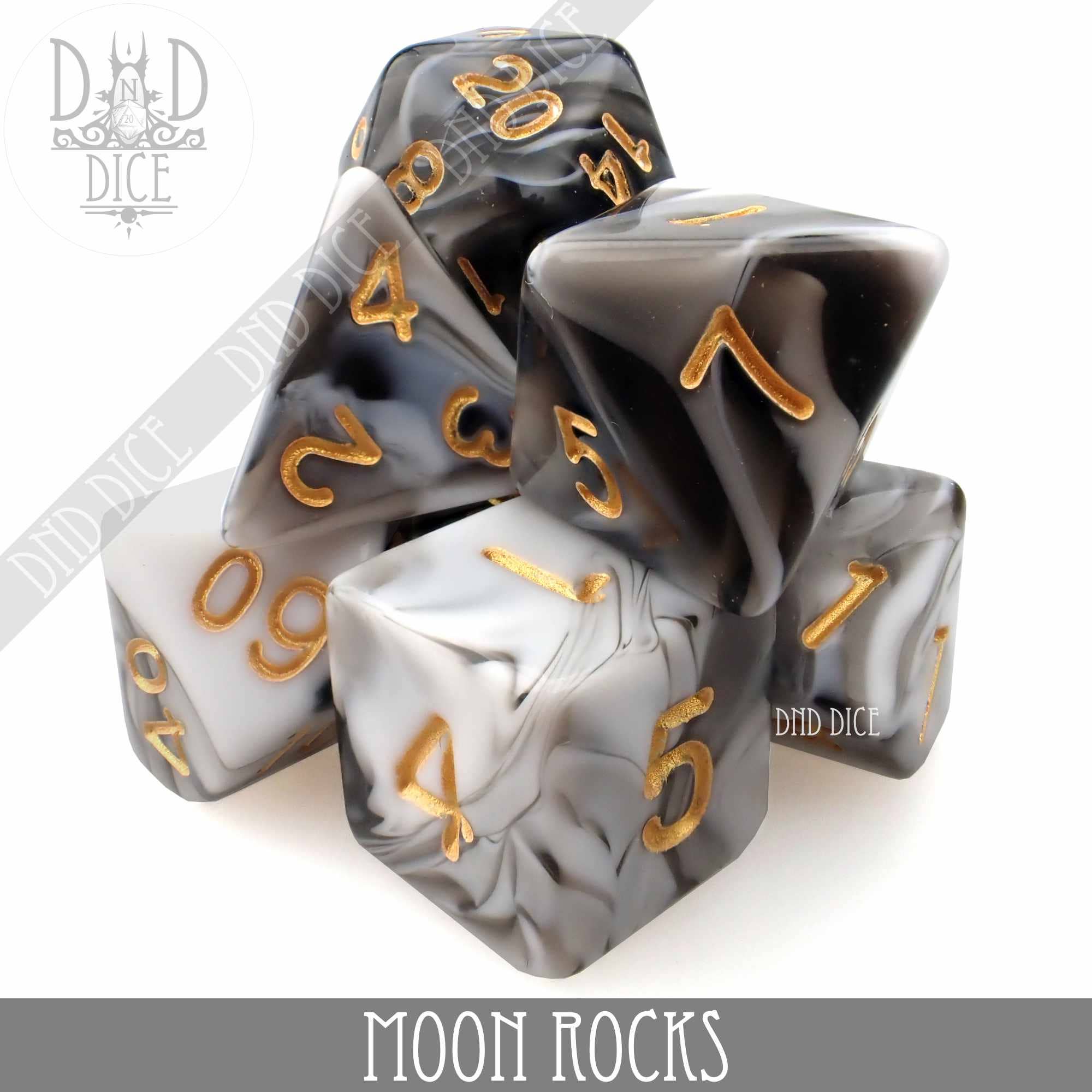 Moon Rocks 7 or 11 dice set: black, white, and gray marbled dice with gold numbers in a clear acrylic bottle.